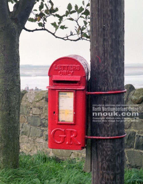 Royal Mail postbox near Kiln Point overlooking Budle Bay, Northumberland