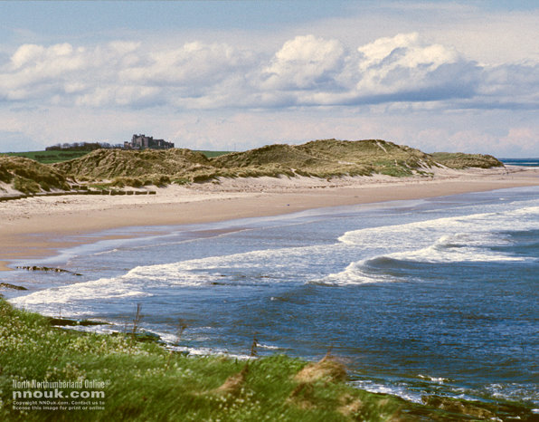 The beach north of Seahouses. Bamburgh castle is in the distance.